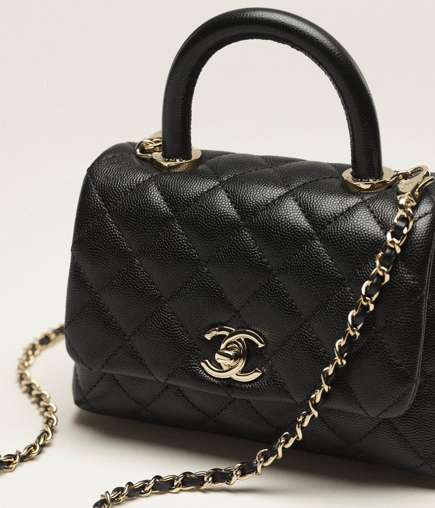 MINI FLAP BAG WITH TOP HANDLE